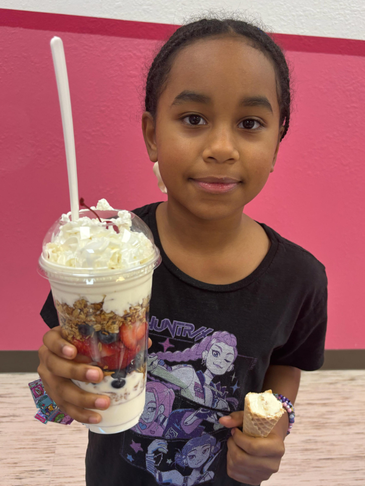 Happy person enjoying a delicious ice cream cone
